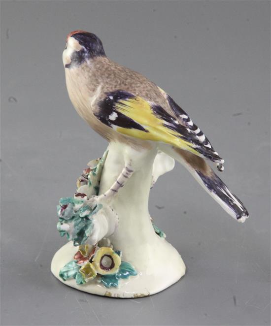 A Derby model of a goldfinch, c.1760-5, h.10cm, restored,